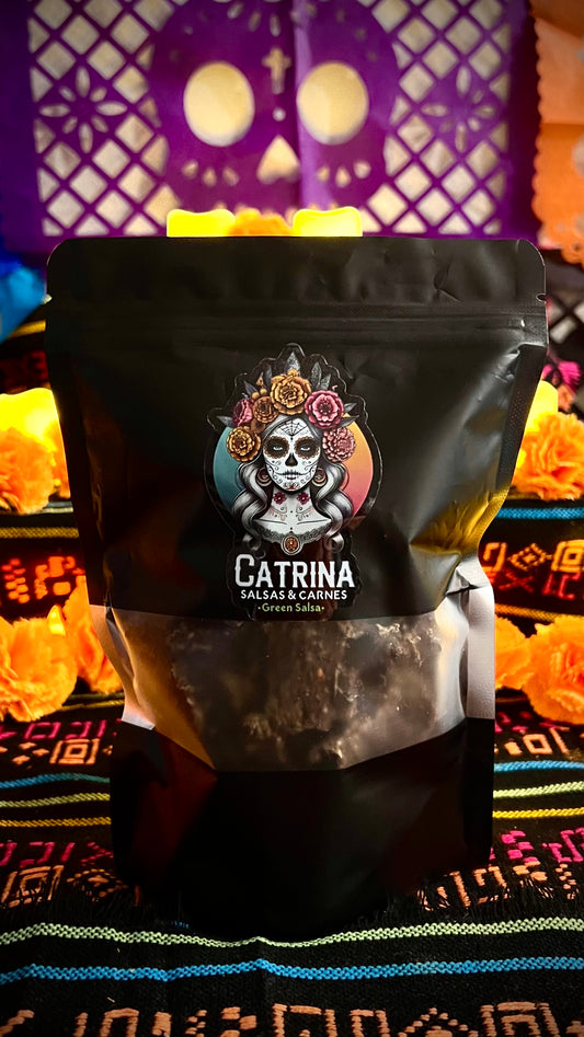 4oz Catrina Green Salsa beef jerky packaging, traditional Mexican flavor, with skull design and decorative background inspired by Día de los Muertos.