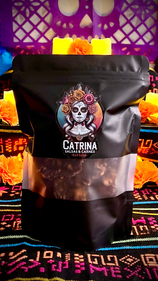 4oz Catrina Red Salsa beef jerky packaging, traditional Mexican flavor, with skull design and decorative background inspired by Día de los Muertos.